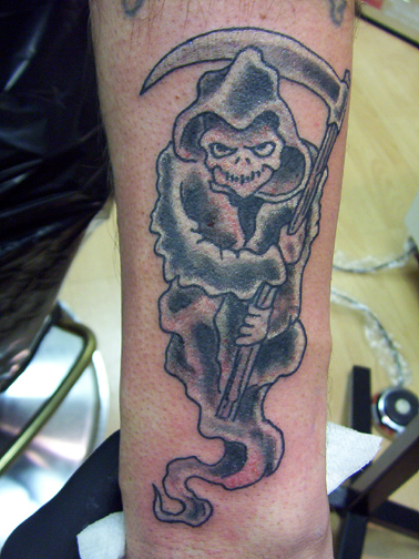 Looking for unique  Tattoos? grim reaper on forearm